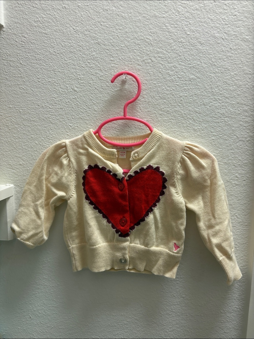 pink chicken | red heart cream cardigan